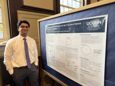 Undergraduate Tarun Shriram presents his poster at Fall Frontiers.